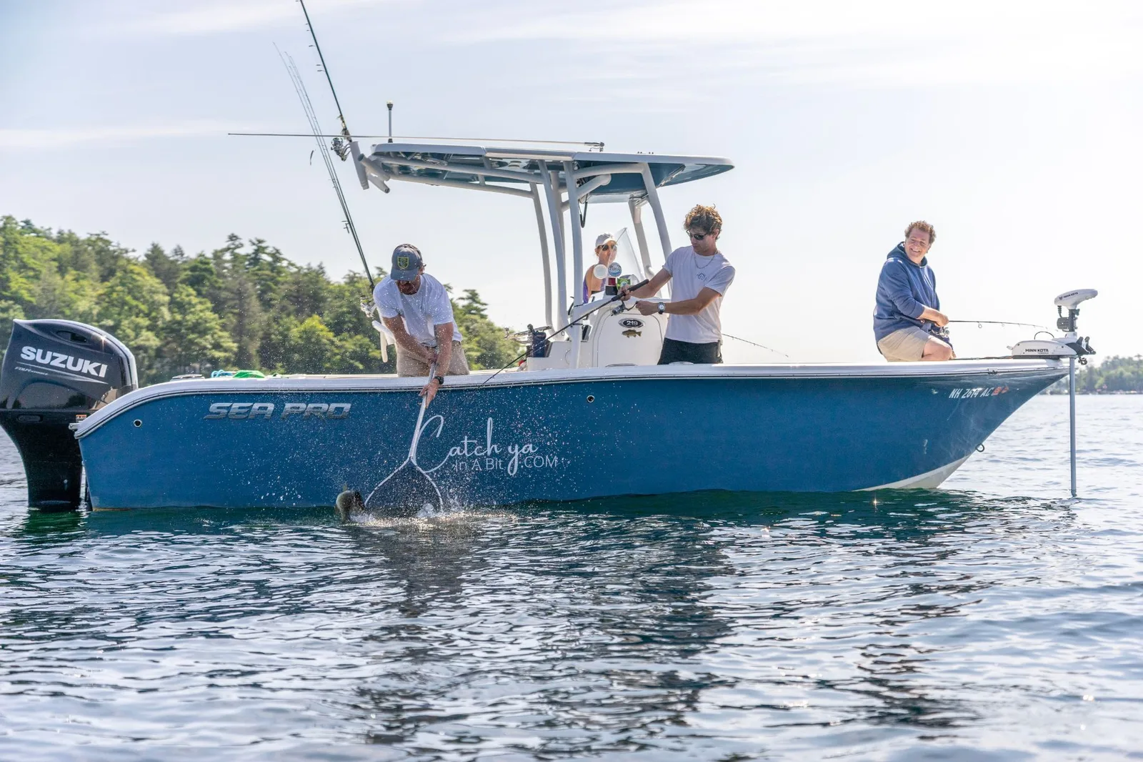 Guests fishing from the Catch Ya In A Bit guide boat on Lake Winnipesaukee