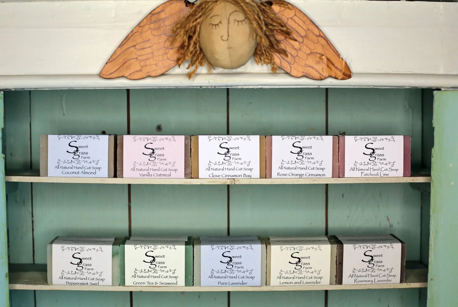 Sweet Grass Farm handmade soaps displayed on a shelf