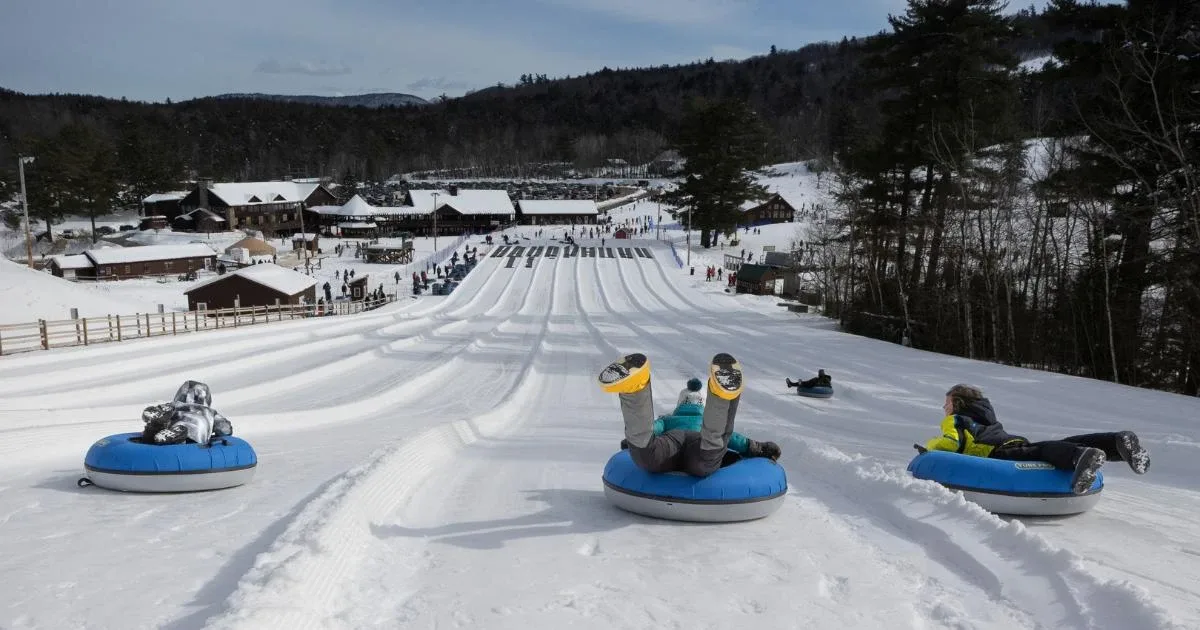 Guests snow tubing at Gunstock Mountain Resort in Gilford, New Hampshire