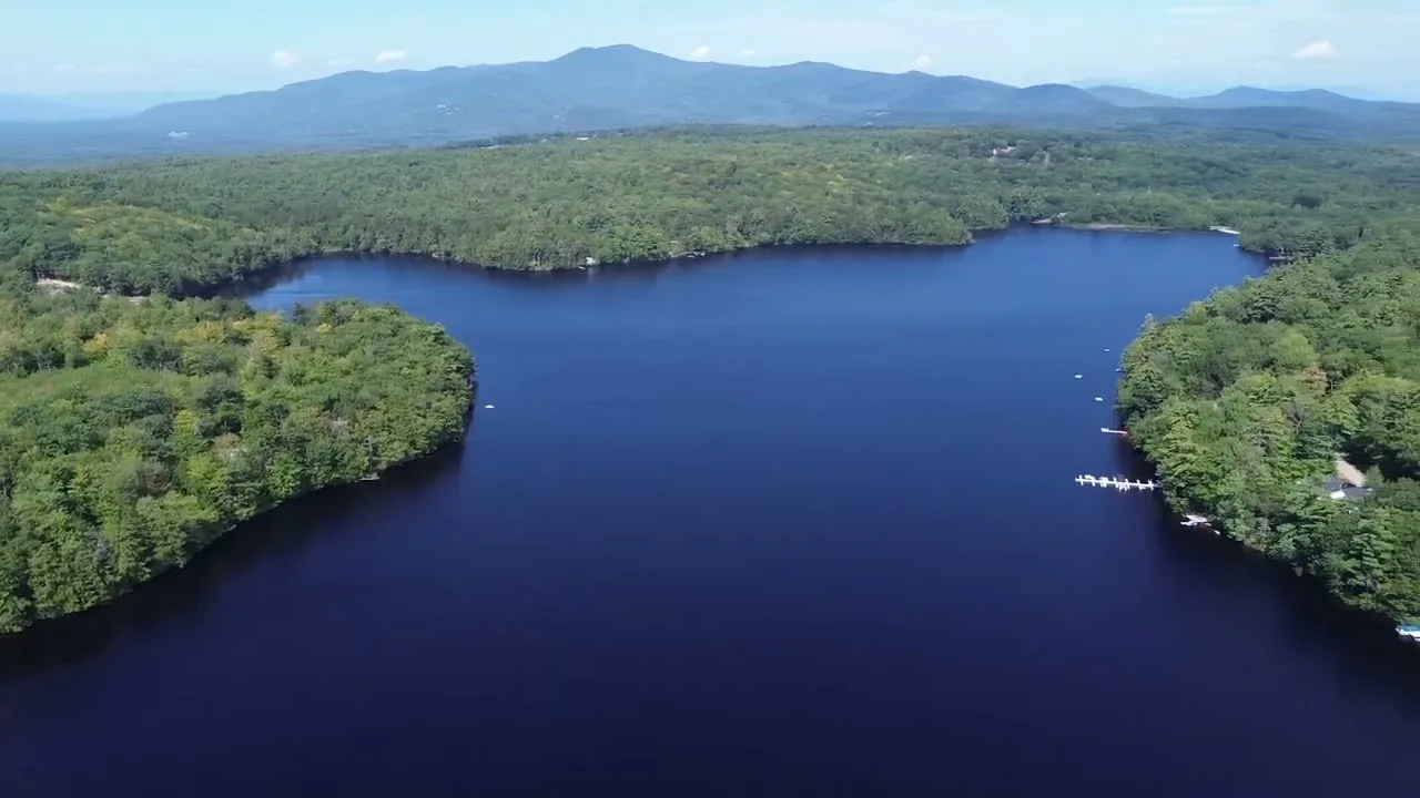 Aerial view of Lower Beech Pond and the surrounding wooded shoreline